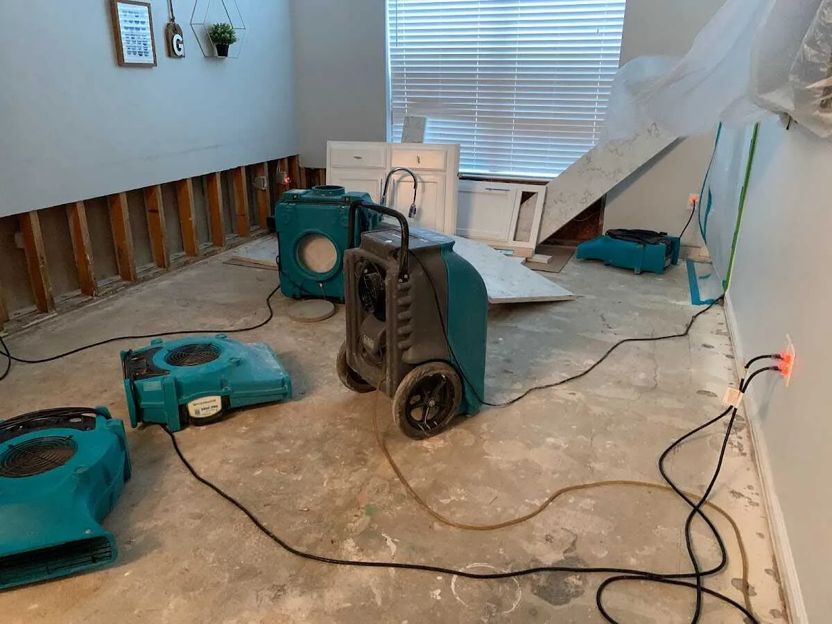 Dehumidifier in flood-cut room for Water Damage Restoration in Helena